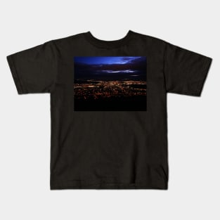 View of city lights from mountain top Kids T-Shirt